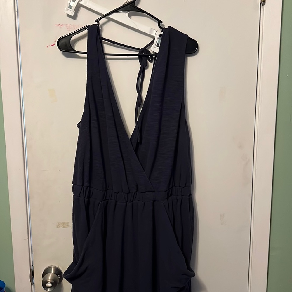 Navy jumpsuit with pockets and tie back